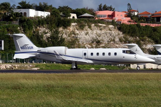 Learjet 60 (N603GR) - Departing rwy 10 on 30-Dec-13 heading for KBED.