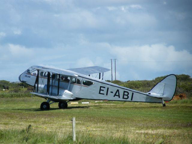 DE HAVILLAND DH-84 Dragon (EI-ABI) - EI-ABI DH 84 DRAGON RAPIDE SEEN HERE TAXING FOR DEPARTUE ON A SIGHTSEEING TOUR AROUND CO CLARE ON JUNE 11TH 2011