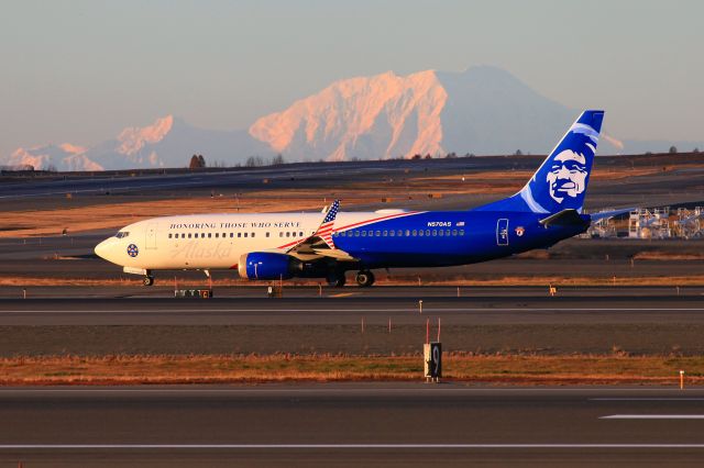 Boeing 737-800 (N570AS) - Fall sunset departure with Mount Foraker in the background.