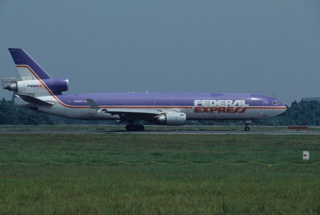 Boeing MD-11 (N608FE) - Departure at Narita Intl Airport Rwy16R on 1995/08/19