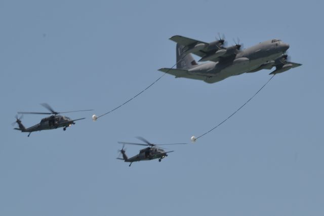 Lockheed C-130 Hercules — - An HC-130J from the 920th Rescue Wing at Patrick Space Force Base simulates refueling two HH-60G Pave Hawk helicopters for the Cocoa Beach Airshow on 15 April 2023. 