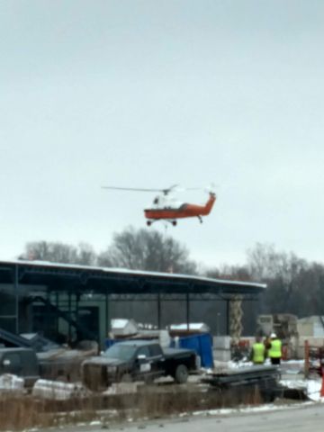 Sikorsky S-58T (N4247V) - Assisting in the construction of a local home improvement store in Terre Haute, IN on 16JAN2019