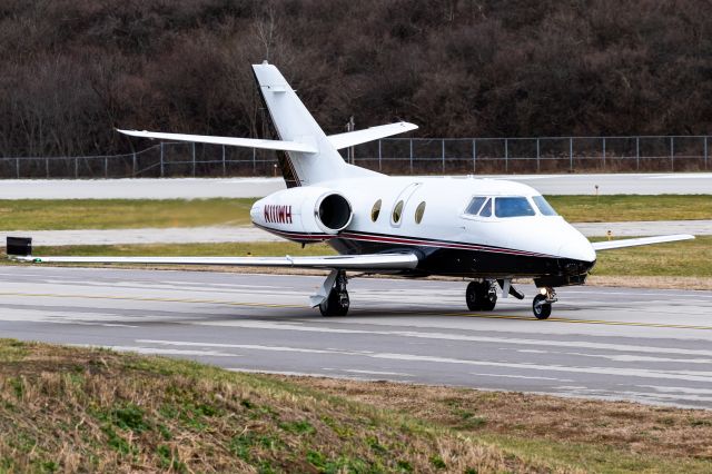 Dassault Falcon 10 (N111WH) - Finally caught a Falcon 10. Although the lighting is not great, I'm still excited I got some photos of this classic jet, now I've caught every Falcon variant!