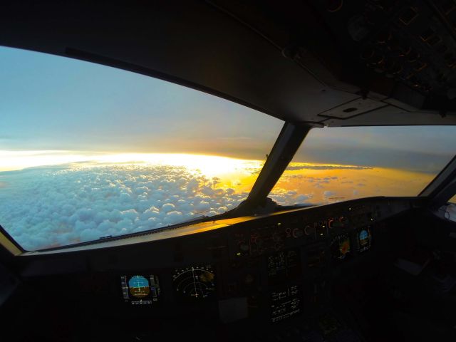 Airbus A320 — - A "molten sunset" descending into KDFW