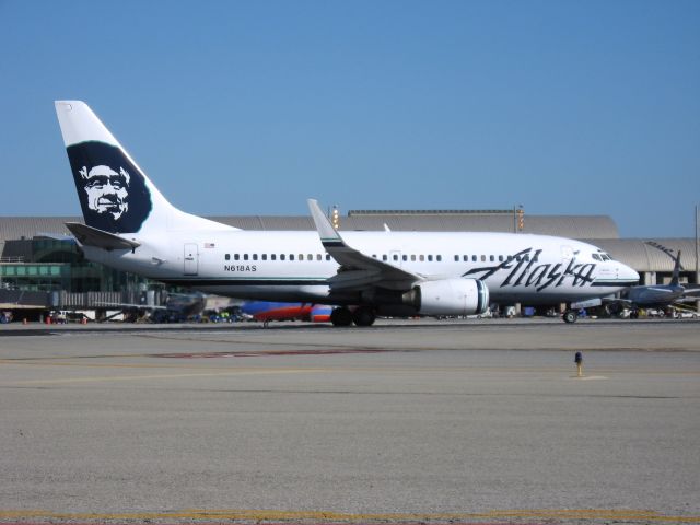 Boeing 737-700 (N618AS) - Holding on RWY 19R