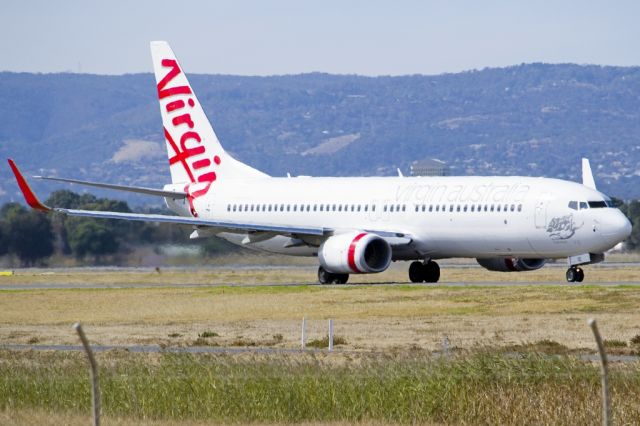 Boeing 737-800 (VH-YIE) - On taxi-way heading for take off on runway 05. Friday 19th April 2013.