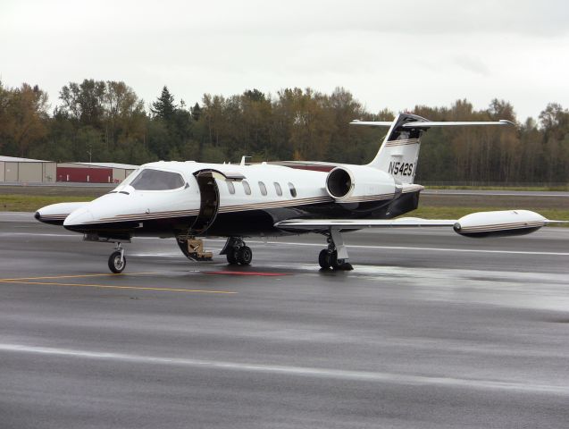 Learjet 35 (N542SA) - Preparing to take Congressman Rick Larsen and other dignitaries on an inaugural flight to dedicate the new Runway 11-29 project at Skagit County Regional Airport in Washington State.  I almost got a ride in this aircraft later in the day, but the starter for the starboard engine would not engage.  :(