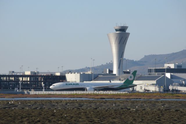 BOEING 777-300 (B-16737) - EVA Air taxiing to gate after landing on runway 28R at SFO.