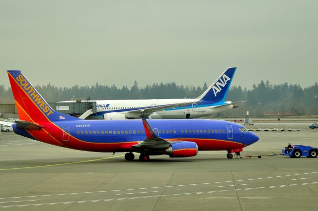 Boeing 737-700 (N363SW) - ANA Dreamliner is in the background.