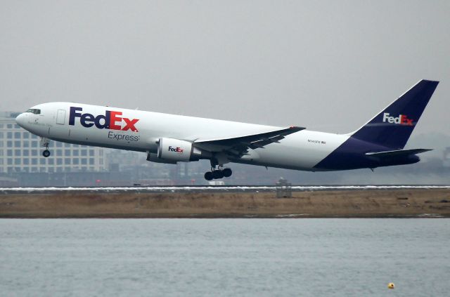 BOEING 767-300 (N145FE) - FDX 822 to Memphis lifting off of 15R