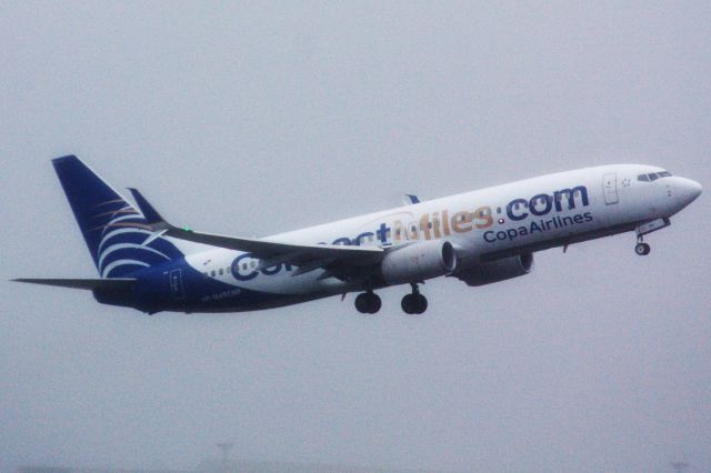 Boeing 737-800 (HP-1849CMP) - Copa B737-800 in ConnectMiles.com livery departs a rainy/foggy Logan Airport on 10/30/21.