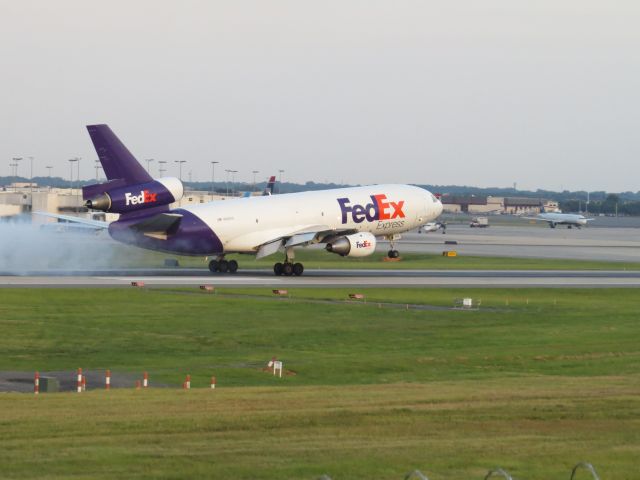 McDonnell Douglas DC-10 (N560FE) - Taken from airport overlook July 17, 2014. Arriving on 18c