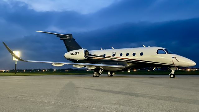 Embraer Legacy 450 (N430FX) - LXJ430, operated by this 2019 Embraer Praetor 500, sitting on the FBO @ KVPZ. 5/20/22. 