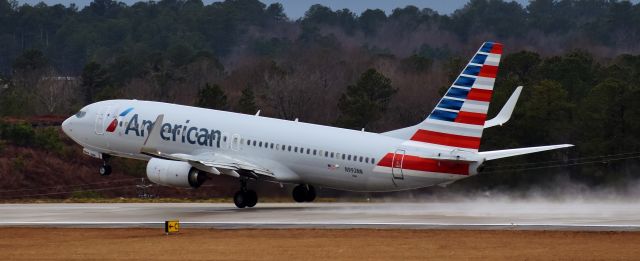 Boeing 737-800 (N992NN) - The only 23R departure of the day headed to DFW - had to have been light, too! Rocket takeoff for this guy.  Lovely rainy day at RDU, 2/7/18.