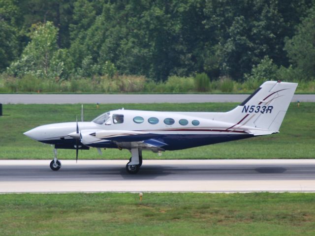 Cessna 421 (N533R) - Rolling down runway 20 KJQF - 7/28/09