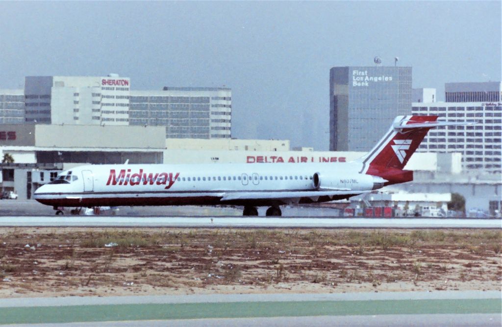 McDonnell Douglas MD-87 (N807ML) - KLAX - apprx 1989 or 1990 Midway MD87 arriving from points east - this jet also later served with Reno Air and was seen often by me at SJC - in that time frame but I never knew until today - that this jet was delv new to Midway. LN 1670.