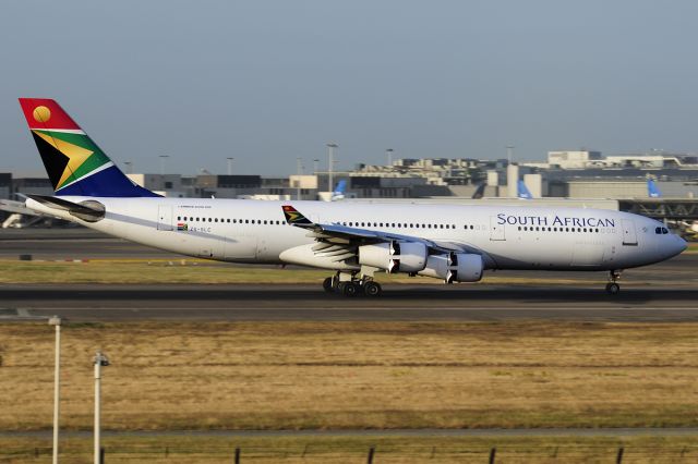 Airbus A340-200 (ZS-SLC) - Shortly after landing on 27R.