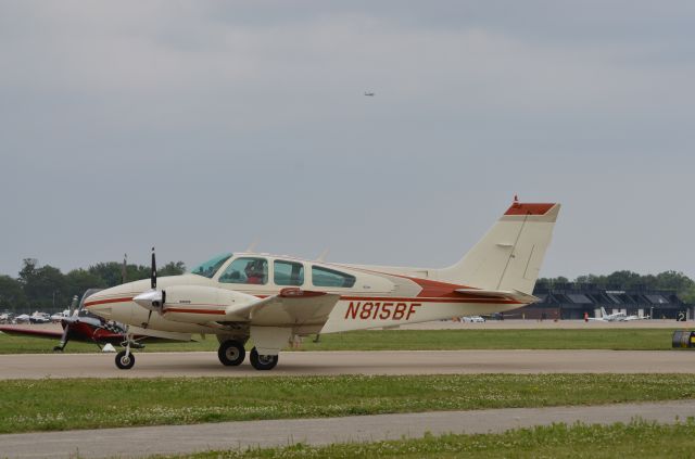 Beechcraft 55 Baron (N815BF) - Bonanza Mass Arrival at Oshkosh AirVenture 2014.