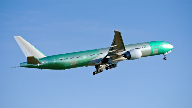 BOEING 777-300 (C-FNNU) - BOE419 flies a missed approach to Rwy 16R during its maiden flight on 11/21/13. (LN:1161 cn 43249).