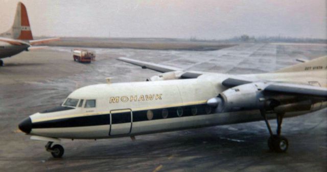 FAIRCHILD HILLER FH-227 (N7801M) - This scan of a very, VERY old Kodak 620 film picture (the first of a two picture set) shows a Mohawk Airlines Fairchild Hiller FH-227 propjet (N7801M), named "Albany," as it is just beginning to taxi away from Gate 11 at Greater Buffalo International (now Buffalo Niagara International ... KBUF)br /I did a bit of restorative editing on this photo.  Both this picture and the second companion photo are severely yellowed with age (they were taken in the last few months of 1968 which makes them around 47-48 years old).  I almost decided to take the easier route and to convert them to black and white, but if I had done that the gold-and-black MOH livery paint would not be viewable ... and Mohawks livery was, in my opinion, one of the most beautiful of the era.br /NOTE:  The actual AIRCRAFT TYPE of this a/c is "FH-227."  However, because a maximum of four letters / numbers are accepted in FAs AIRCRAFT TYPE data box, only the "FH22" is shown under this picture.