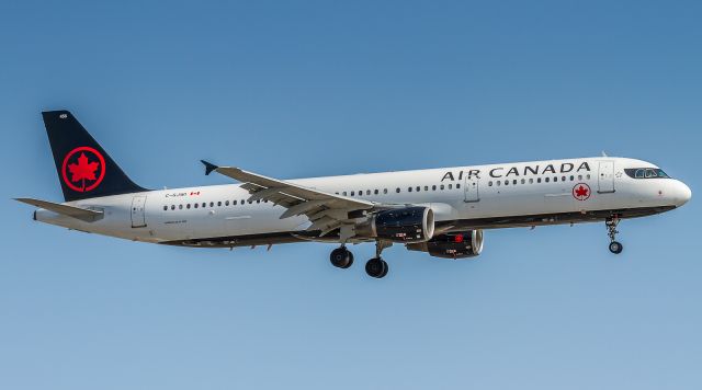 Airbus A321 (C-GJWI) - Second attempt at landing on runway 23 for ACA140 from Calgary after a tardy exit from the previous aircraft forced a go-around