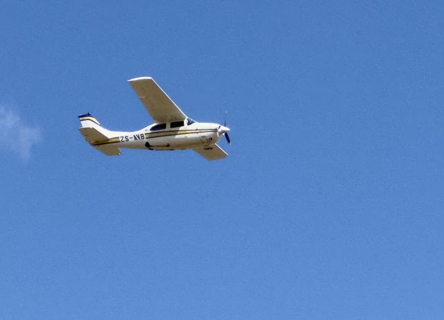 Cessna Centurion (ZS-AVB) - At Ingwelala. 15-MAR-2024