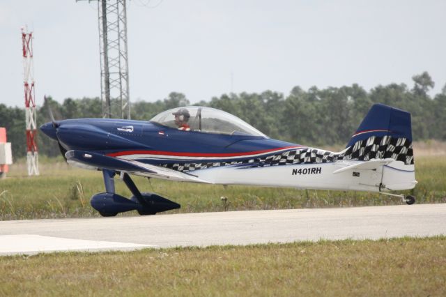 Vans RV-8 (N401RH) - Team RV performing at the 2012 Florida International Airshow