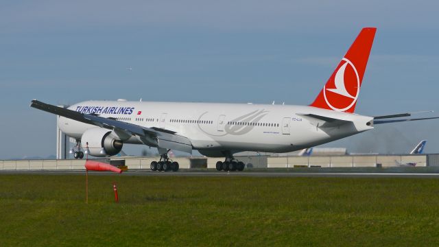 BOEING 777-300 (TC-LJA) - BOE539 landing on Rwy 34L to complete a ferry flight from KVCV on 4/19/15. (ln 1296 / cn 44121). The aircraft was at KVCV for painting.