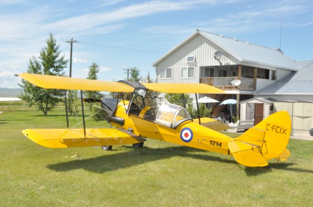 — — - de Havilland Tiger Moth C-FCIX flown by 89 year old Gordon Jones of High River AB