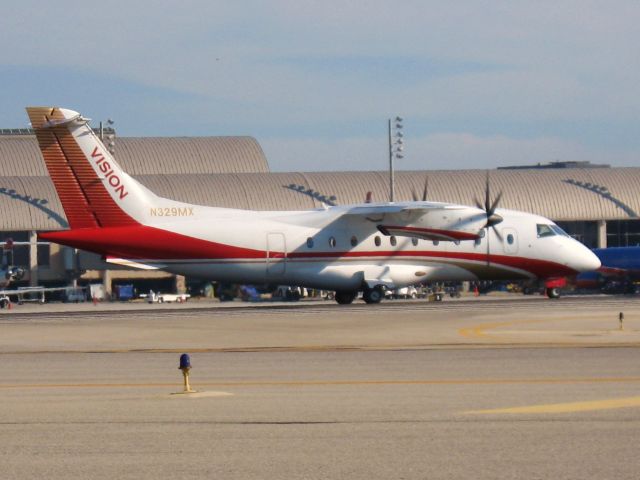 Fairchild Dornier 328 (N329MX) - Holding on RWY 19R