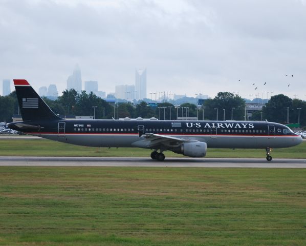 Airbus A321 (N178US) - Very close bird encounter 18C - 7/12/10