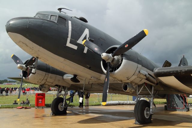 N147DC — - This Douglas C-47 was made at the Douglas Plant, Long Beach in 1943. It's illustrious career included involvement in the D-Day landings. Recently it has been used in film and T.V. including, Spies Like Us, Shining Through and Band of Brothers amongst others. here it is on static display at Farnborough 2012.