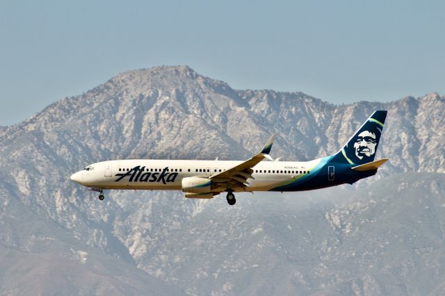 Boeing 737-900 (N306AS) - Alaska 737-900 on short final to Ontario's 26R with the beautiful San Gabriel mountains in the foreground