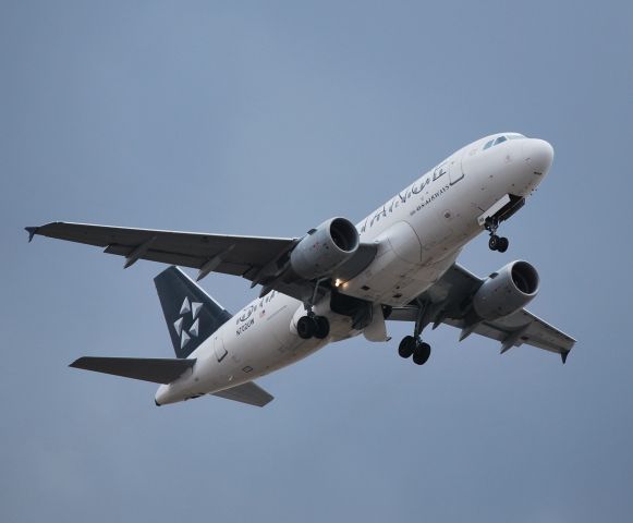 Airbus A319 (N702UW) - Departing 36R - 2/23/10