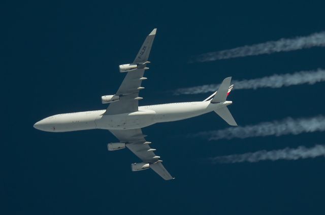 Airbus A340-300 (F-GLZR) - 7/2/16 Air France Airbus A340-300 F-GLZR Passes Overhead West Lancashire, England,UK at FL360 working route Paris CDG-Montreal AFR342.Photograph taken from the ground, Pentax K-5.