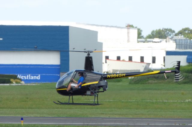 Robinson R-22 (N964SH) - Shown here making a low pass is a Robinson R-22 helo in the Summer of 2017. 