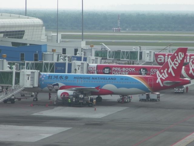 Airbus A320 (9M-AHL) - Taken from klia2 smoking area.