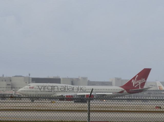 Boeing 747-400 (G-VBIG) - Departing Miami." In a rain shower!"