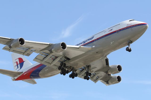 Boeing 747-200 — - A Malaysian Airlines B747-400 approaches runway 027L at LHR.