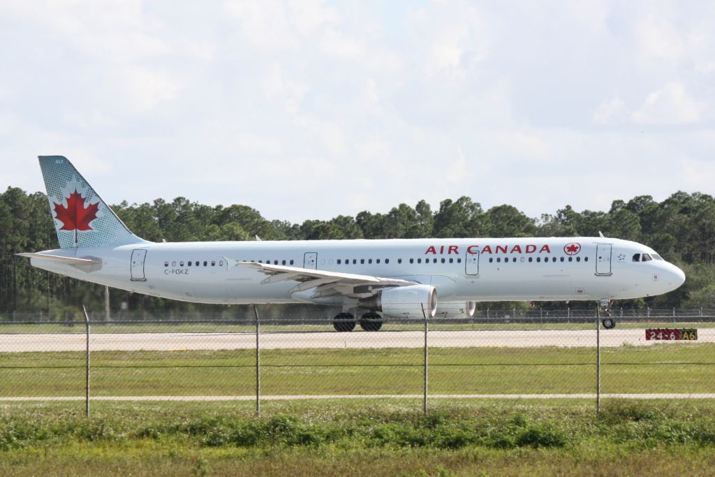 Airbus A321 (C-FGKZ) - Air Canada Flight 1235 (C-FGKZ) departs Southwest Florida International Airport enroute to Toronto-Pearson International Airport