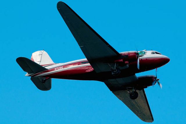 Douglas DC-3 (N728G) - 1/5/13:  Troy Plastics 1942 Douglas DC-3C N728G (c/n 4359) on short final approach over Miami Lakes enroute to runway 9L at Opa-locka Executive Airport.  They flew nonstop from Troy, Alabama, presumably bringing in fans for the BCS Championship game between Alabama and Notre Dame.