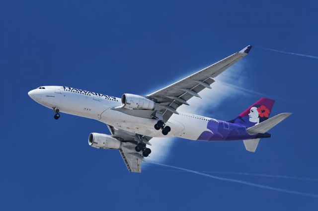 N385HA — - Pockets of increased humidity leave trails as a Hawaiian Airlines operated Airbus A330-243 widebody jet passes through on final approach to the Los Angeles International Airport, LAX, in Westchester, Los Angeles, California