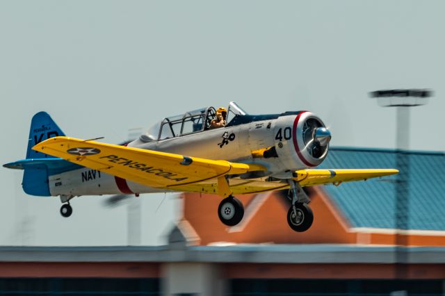 N211A — - North American SNJ-6 N211A a "Jersey Jerk" taking off at KRDG during WWII Weekend