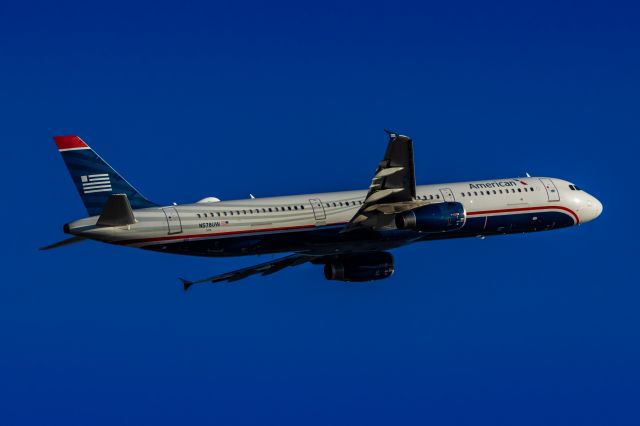 Airbus A321 (N578UW) - An American Airlines A321 in US Airways retro livery taking off from PHX on 1/25/23. Taken with a Canon R7 and Tamron 70-200 G2 lens.