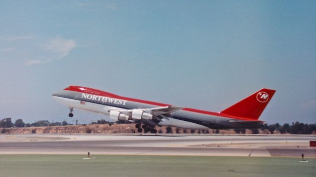 Boeing 747-200 (N625US) - Northwest Airlines 747-200 rotating off Runway 24L sometime in the early 90s