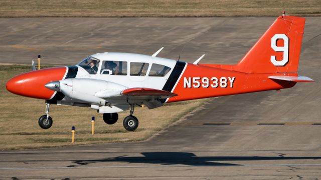 Piper Apache (N5938Y) - N5938Y floating over Frederick Municipal Airport's runway 30 after doing some patterns around the field