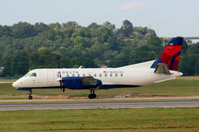 Saab 340 (N452XJ) - One of Mesabas Saab 340s painted in the new Delta colors rolls down taxiway A.