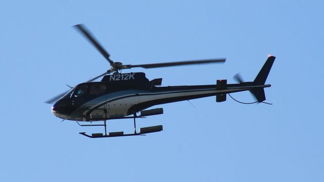 Eurocopter AS-350 AStar (N212K) - Seen flying down the East River from Brooklyn on April 15th, 2016.