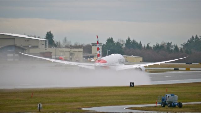 Boeing 787-8 (N800AN) - BOE817 on rotation from a wet Rwy 16R for a C1 flight on 1/15/15. (ln 241 / cn 40618).