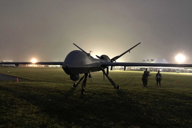 General Atomics Reaper (02-4003) - A General Atomics Aeronautical Systems Inc MQ-9 Reaper, the featured Aircraft for the 2018 United States Air Force Marathon, on display before the opening ceremonies at the National Museum of the United States Air Force/Wright-Patterson Air Force Base on 15 Sep 2018. MQ-9, 02-4003, c/n PB-003, was brought in from Creech Air Force Base, NV for the festivities. My wife and I participated in the 5K (14 Sep 2018) and 10K (15 Sep 2018) portions.